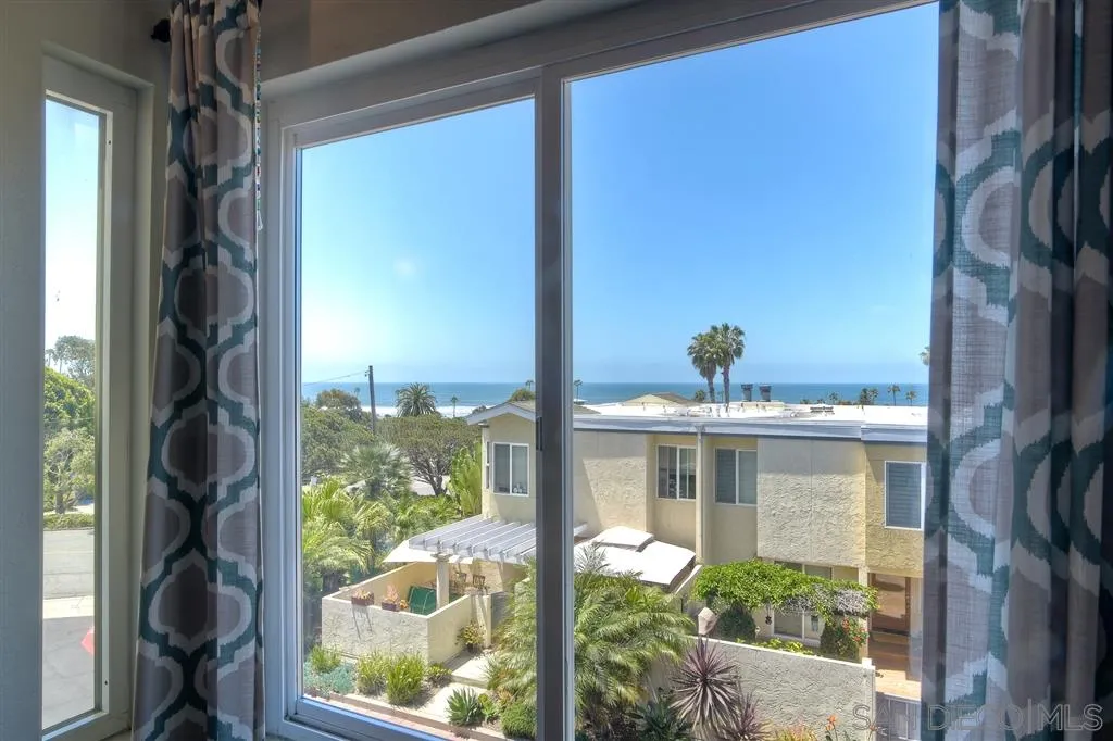 2130 Orinda Drive, Unit E Cardiff, CA 92007 - Photo 12 of 24 a front view of a house with a porch