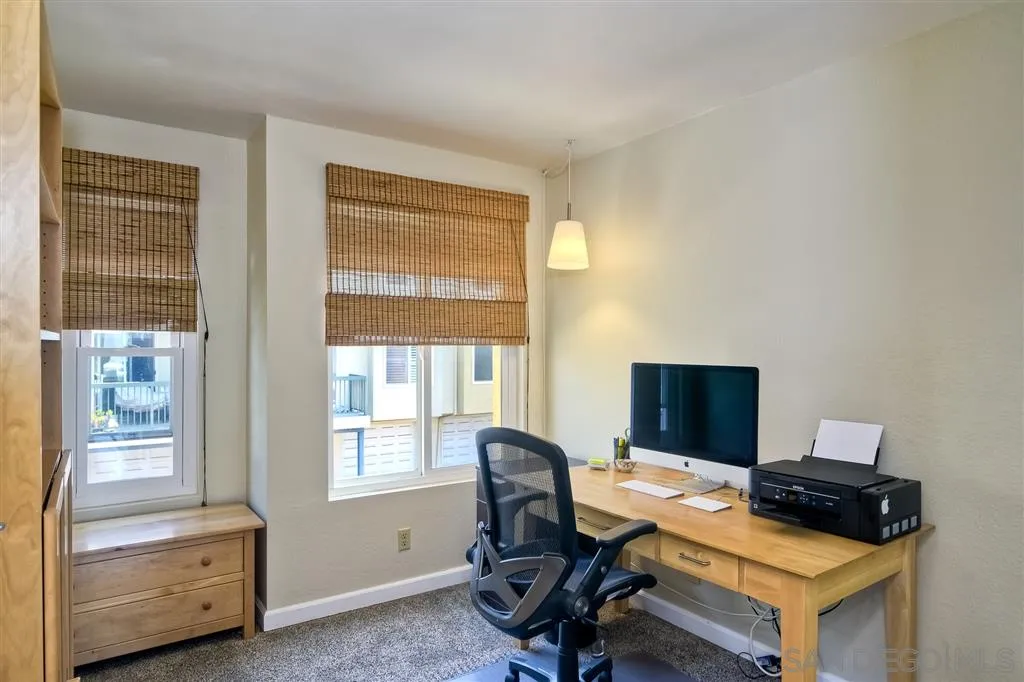 2130 Orinda Drive, Unit E Cardiff, CA 92007 - Photo 20 of 24 a view of a workspace with furniture and a window
