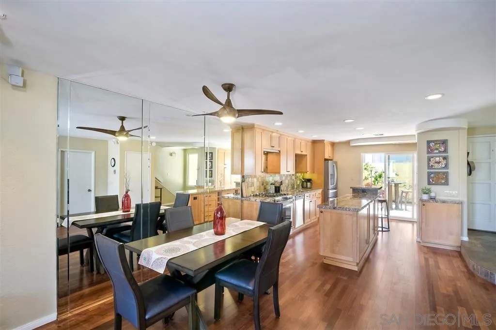 2130 Orinda Drive, Unit E Cardiff, CA 92007 - Photo 8 of 24 a view of a dining room with furniture window and wooden floor