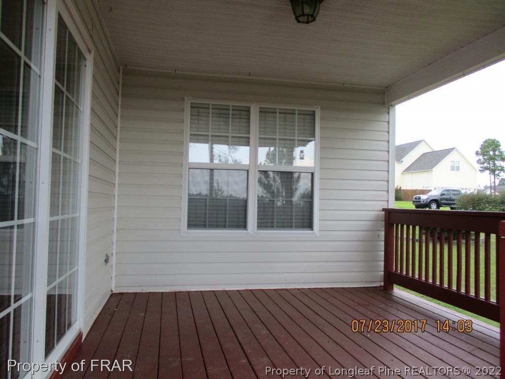 154 Chesapeake Road Cameron, NC 28326 - Photo 21 of 29 a view of a balcony with wooden floor