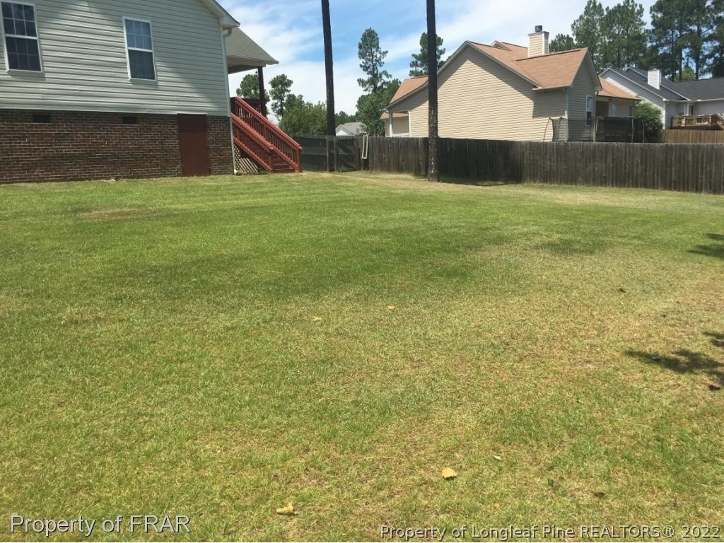 154 Chesapeake Road Cameron, NC 28326 - Photo 23 of 29 a view of a house with a yard