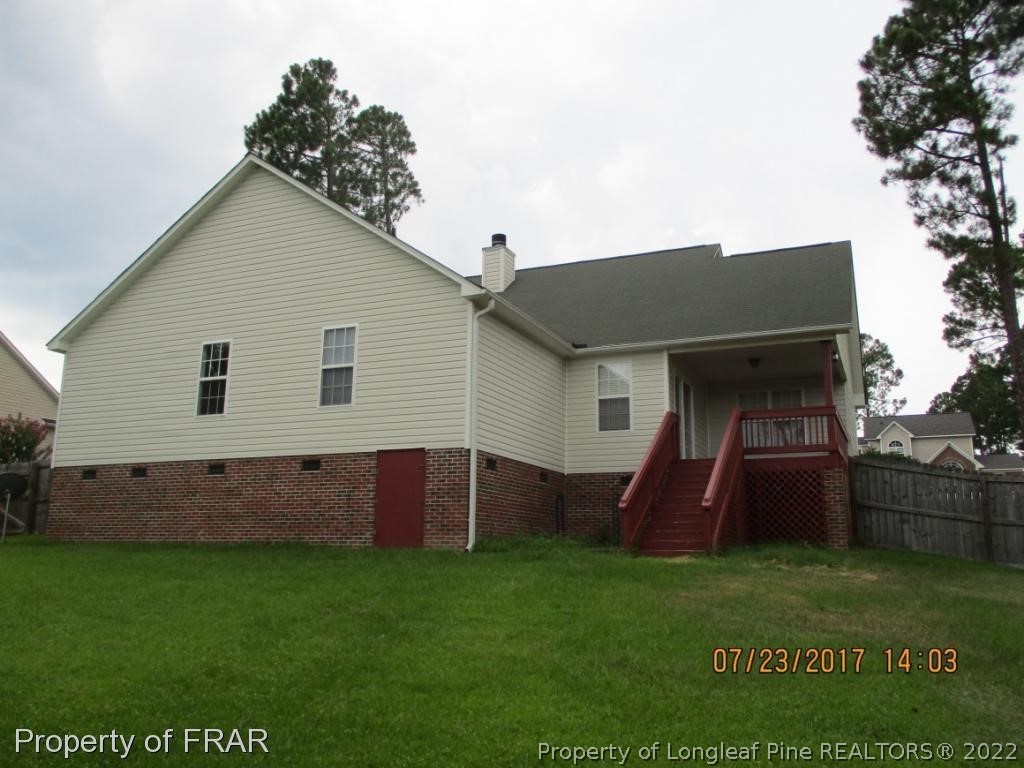 154 Chesapeake Road Cameron, NC 28326 - Photo 26 of 29 a front view of house with garden