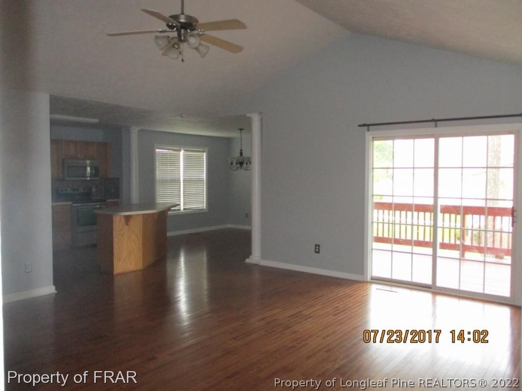 154 Chesapeake Road Cameron, NC 28326 - Photo 5 of 29 wooden floor in an empty room with a window