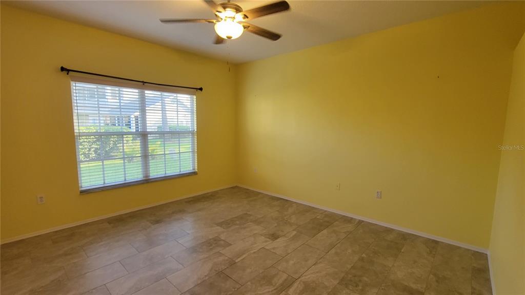6330 Green Oak Circle, Unit 6330 Bradenton, FL 34203 - Photo 16 of 58 a view of an empty room with a window