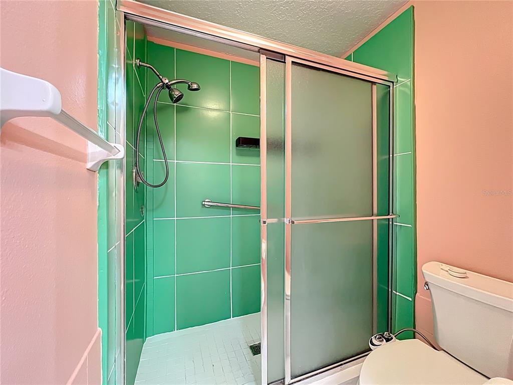 6330 Green Oak Circle, Unit 6330 Bradenton, FL 34203 - Photo 18 of 58 a bathroom with a shower and toilet