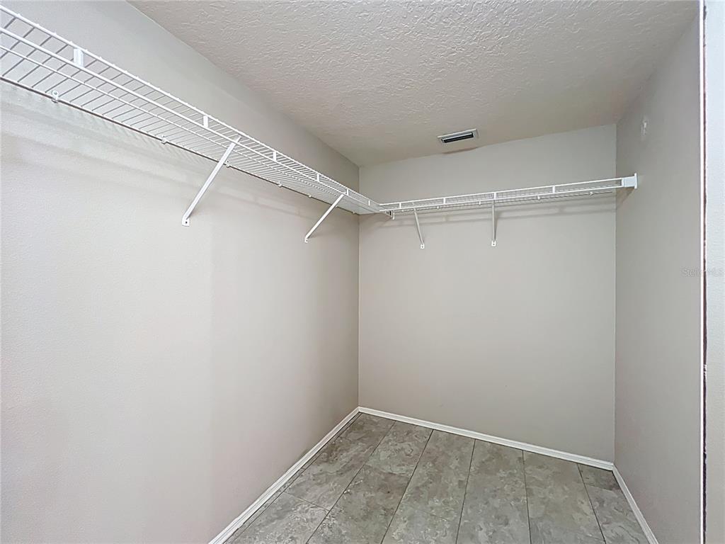 6330 Green Oak Circle, Unit 6330 Bradenton, FL 34203 - Photo 19 of 58 a view of a room with racks on the wall