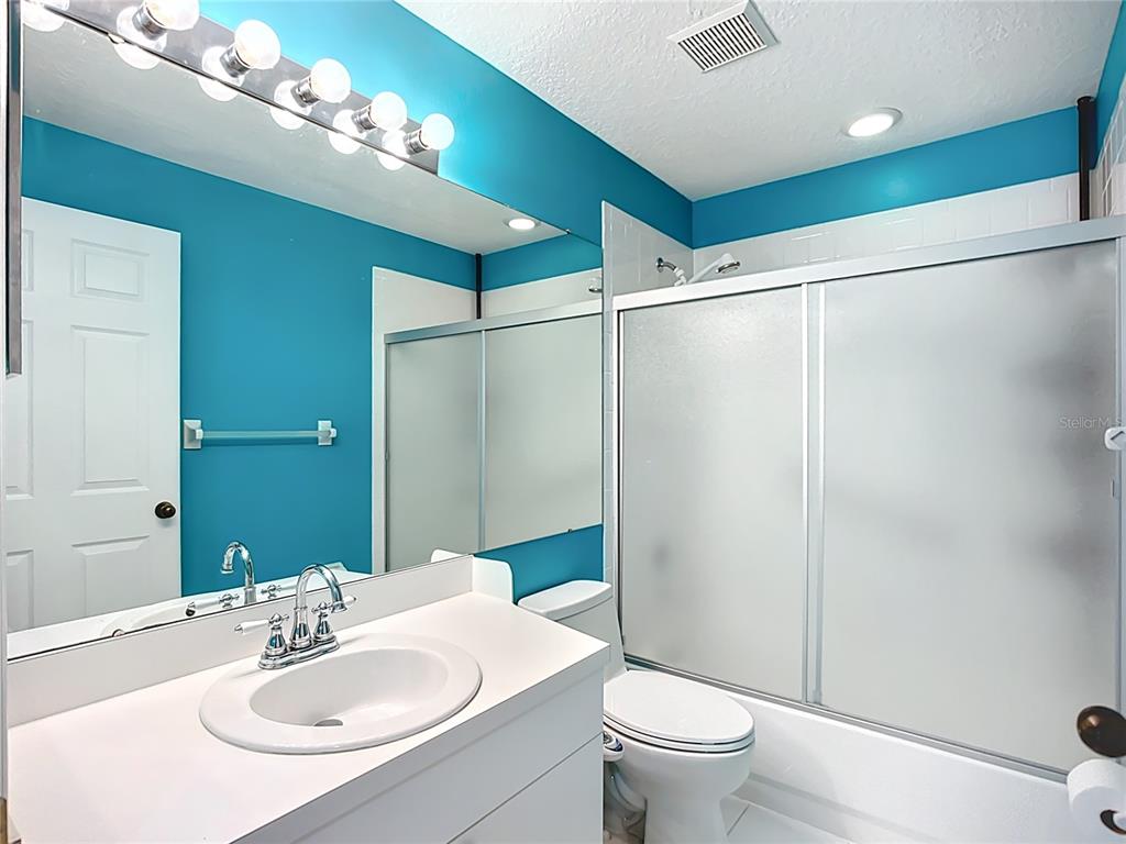 6330 Green Oak Circle, Unit 6330 Bradenton, FL 34203 - Photo 22 of 58 a bathroom with a sink toilet and shower