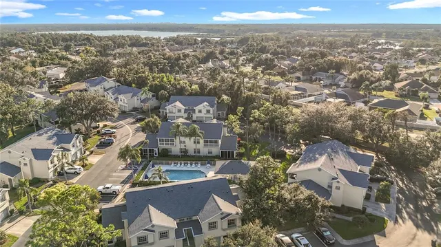 an aerial view of a house with outdoor space