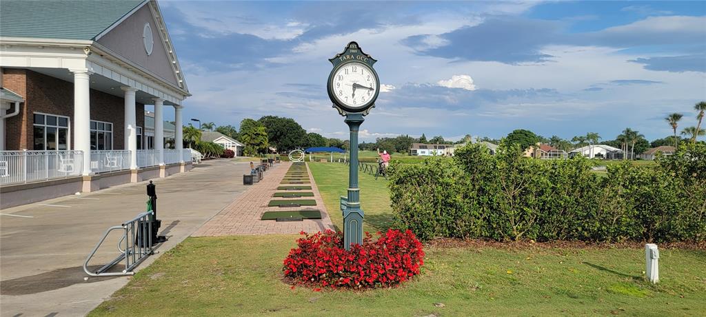 6330 Green Oak Circle, Unit 6330 Bradenton, FL 34203 - Photo 45 of 58 a view of a bench in a yard