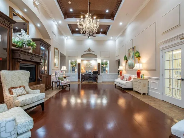 an aerial view of multiple houses with yard