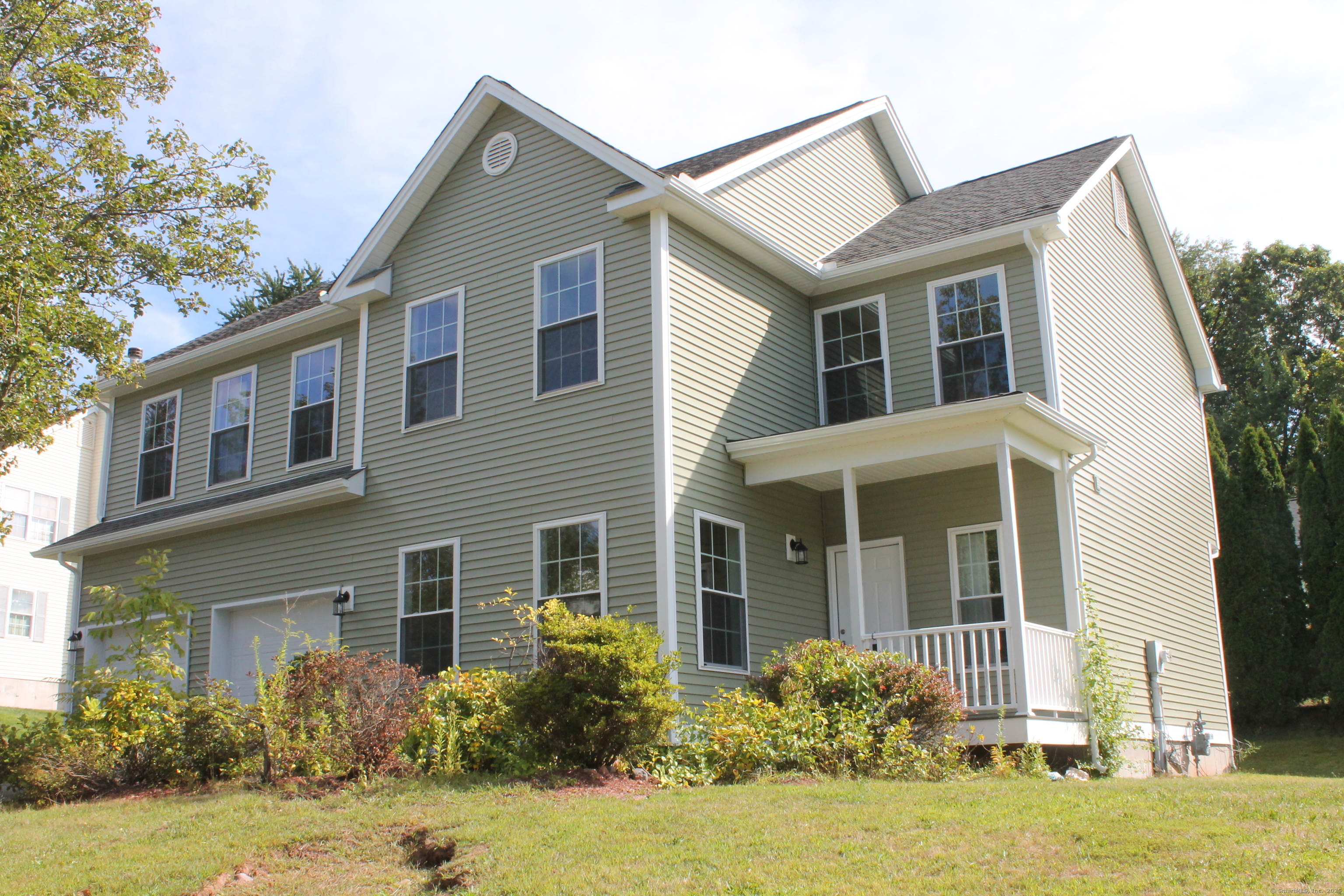 15 Glen Ridge Road Hamden, CT 06518 - Photo 2 of 36 front view of a house with a yard