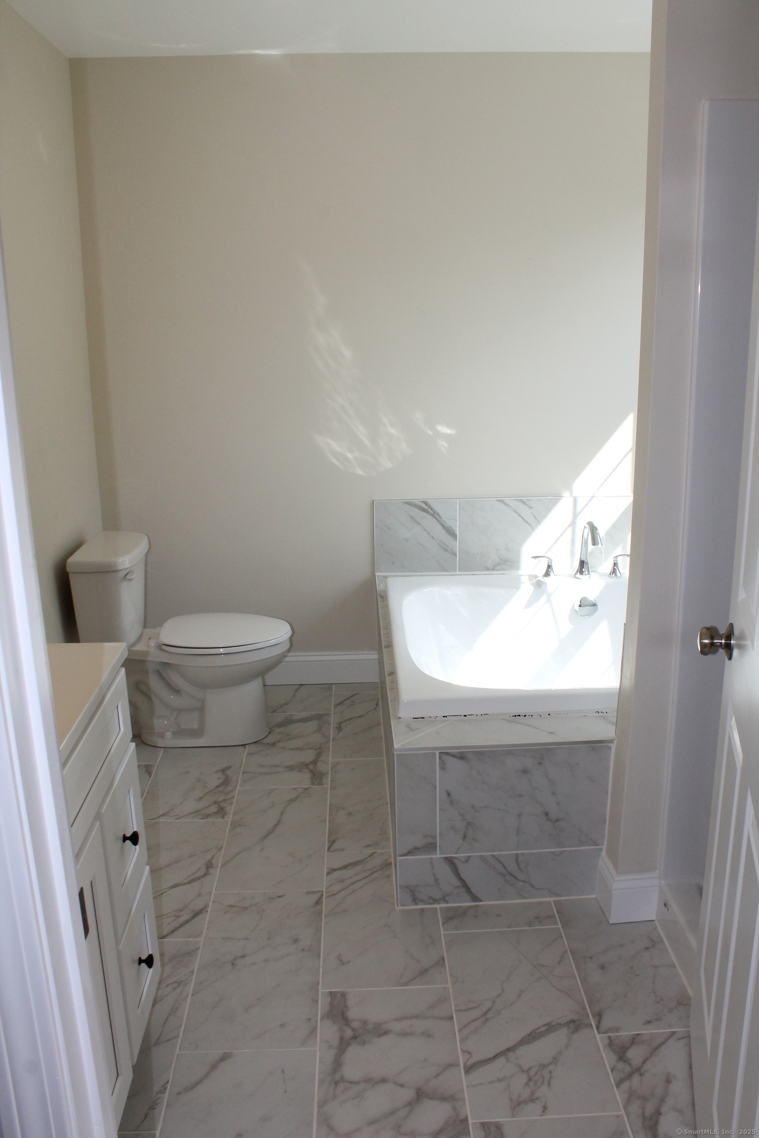 15 Glen Ridge Road Hamden, CT 06518 - Photo 21 of 36 a bathroom with a sink and a toilet