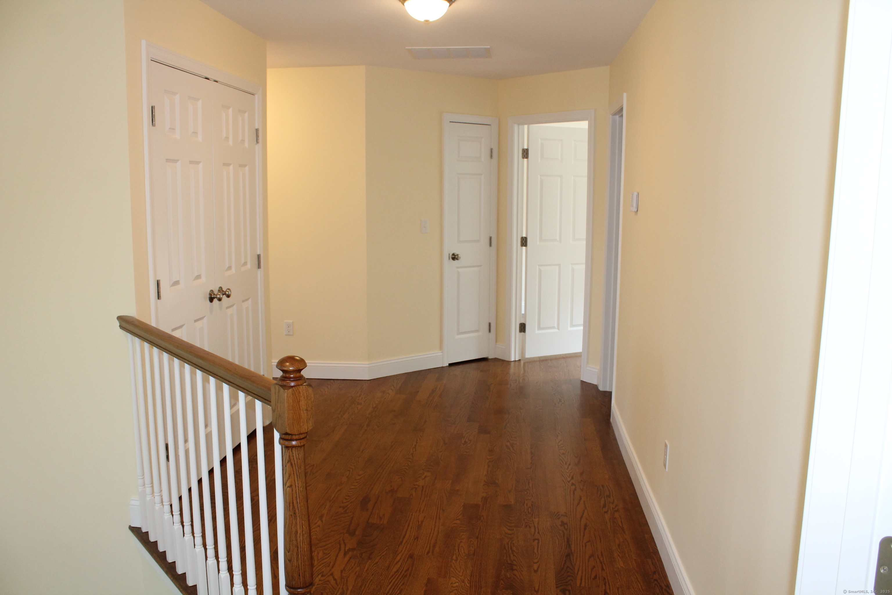15 Glen Ridge Road Hamden, CT 06518 - Photo 26 of 36 a view of a hallway with wooden floor