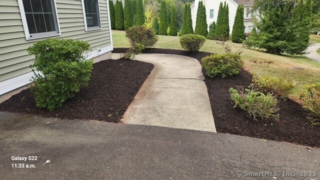 15 Glen Ridge Road Hamden, CT 06518 - Photo 3 of 36 a view of a backyard with potted plants