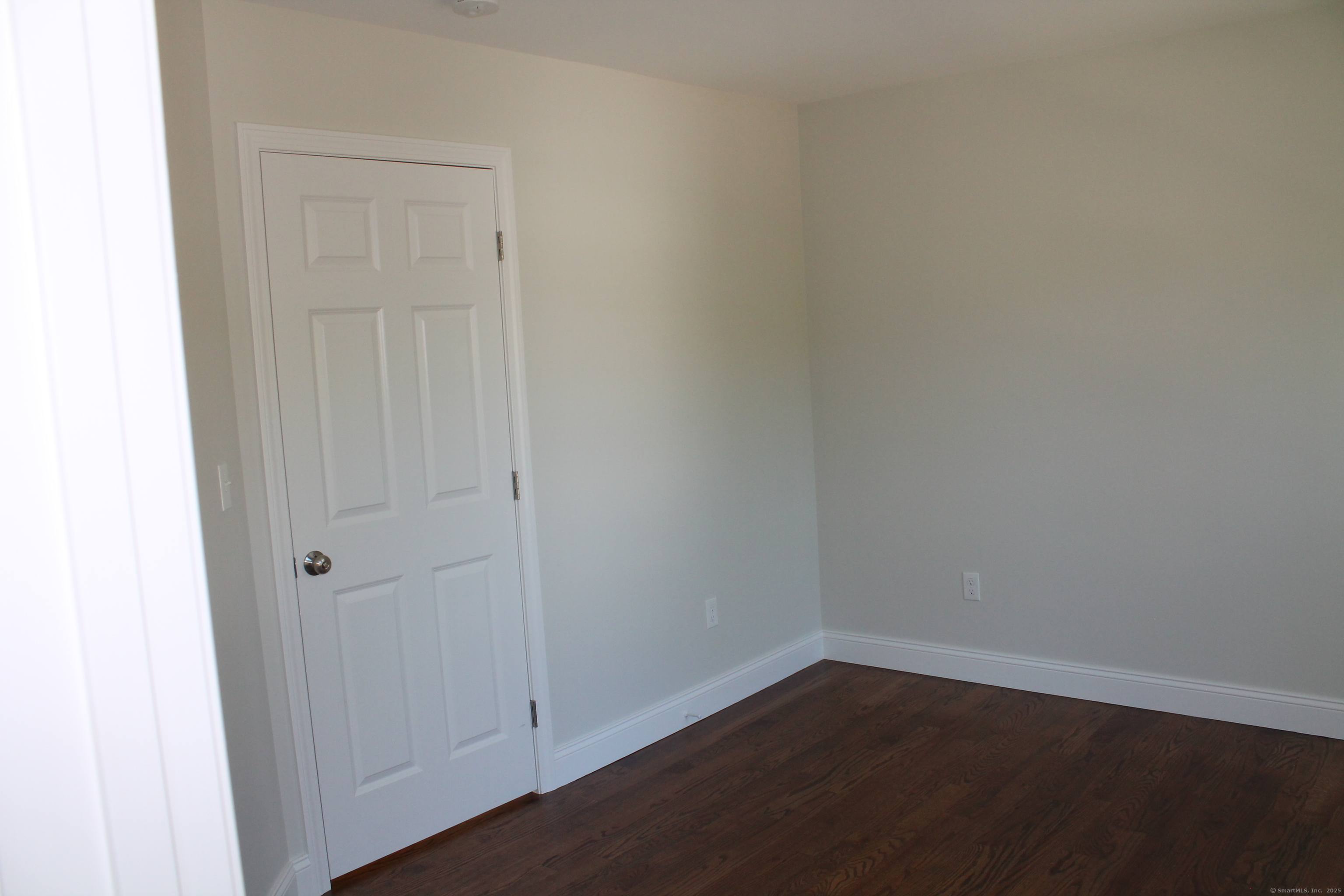 15 Glen Ridge Road Hamden, CT 06518 - Photo 35 of 36 an empty room with wooden floor