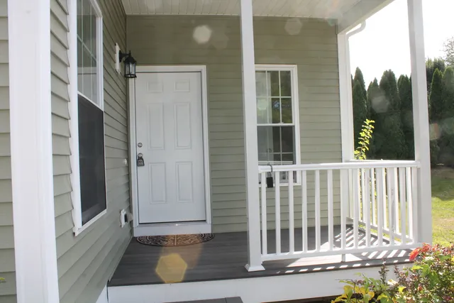 a view of porch with a chair