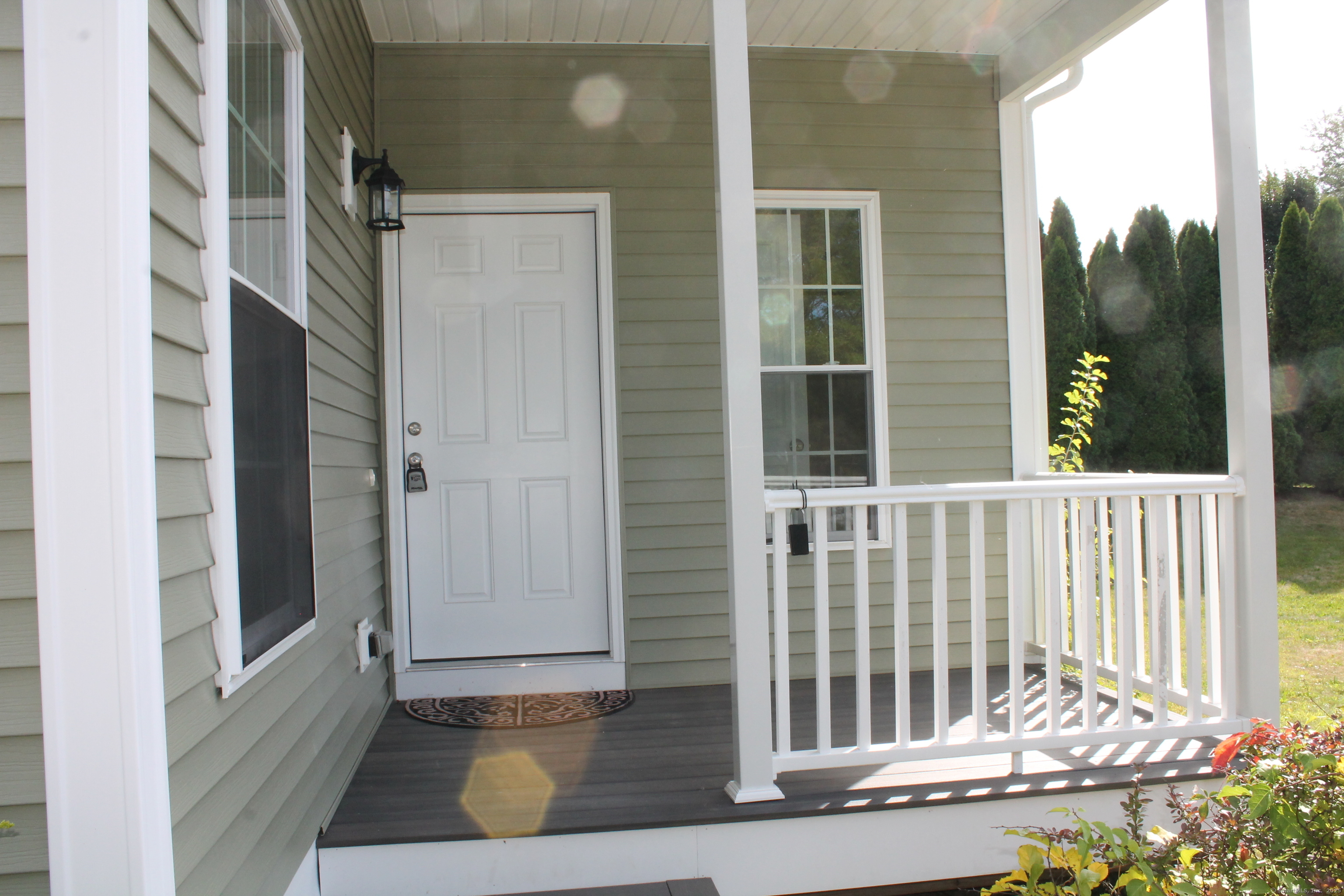 15 Glen Ridge Road Hamden, CT 06518 - Photo 10 of 36 a view of porch with a chair