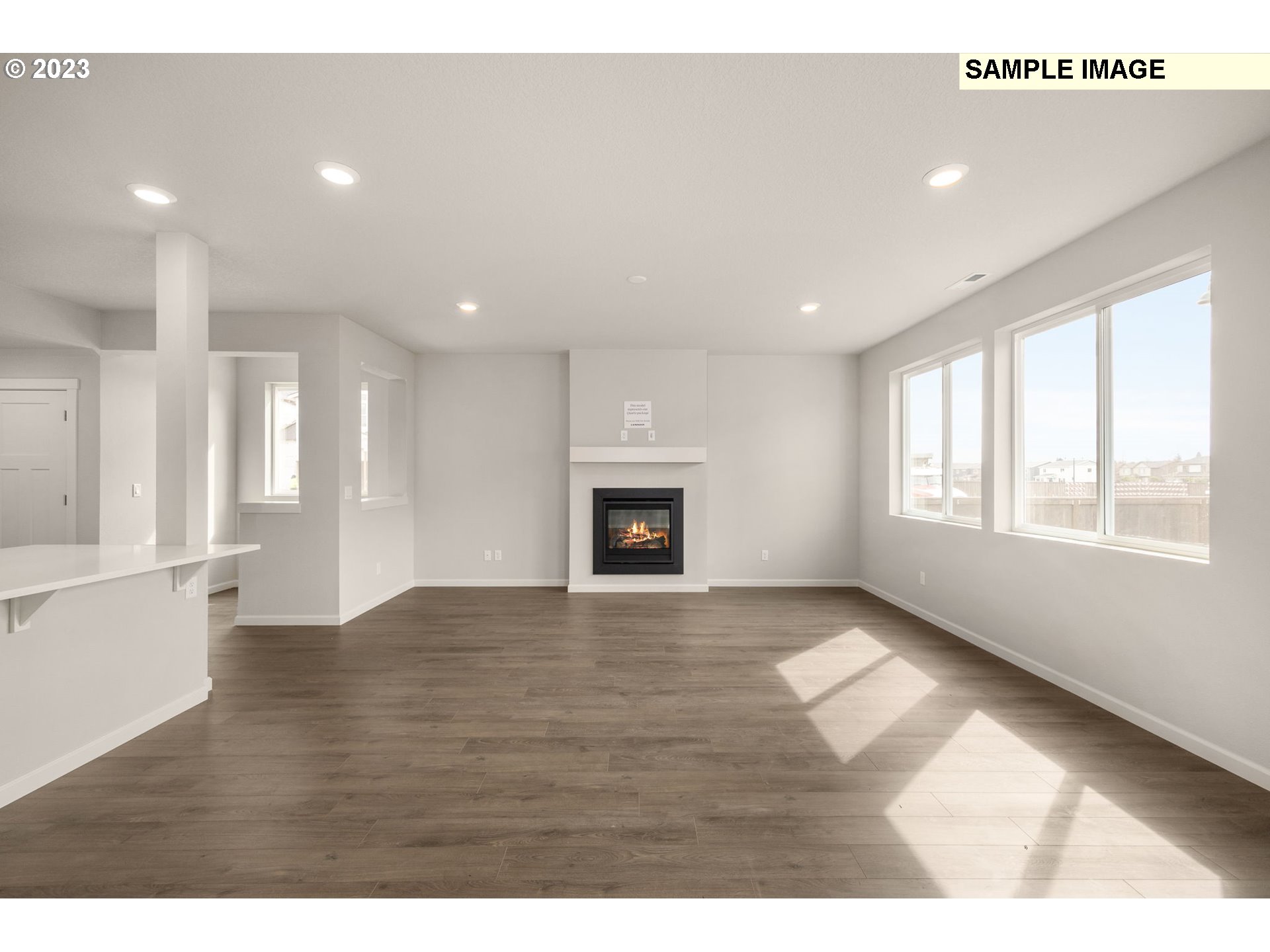 1047 Clemson Street Gervais, OR 97026 - Photo 18 of 38 a view of an empty room with a window and fireplace