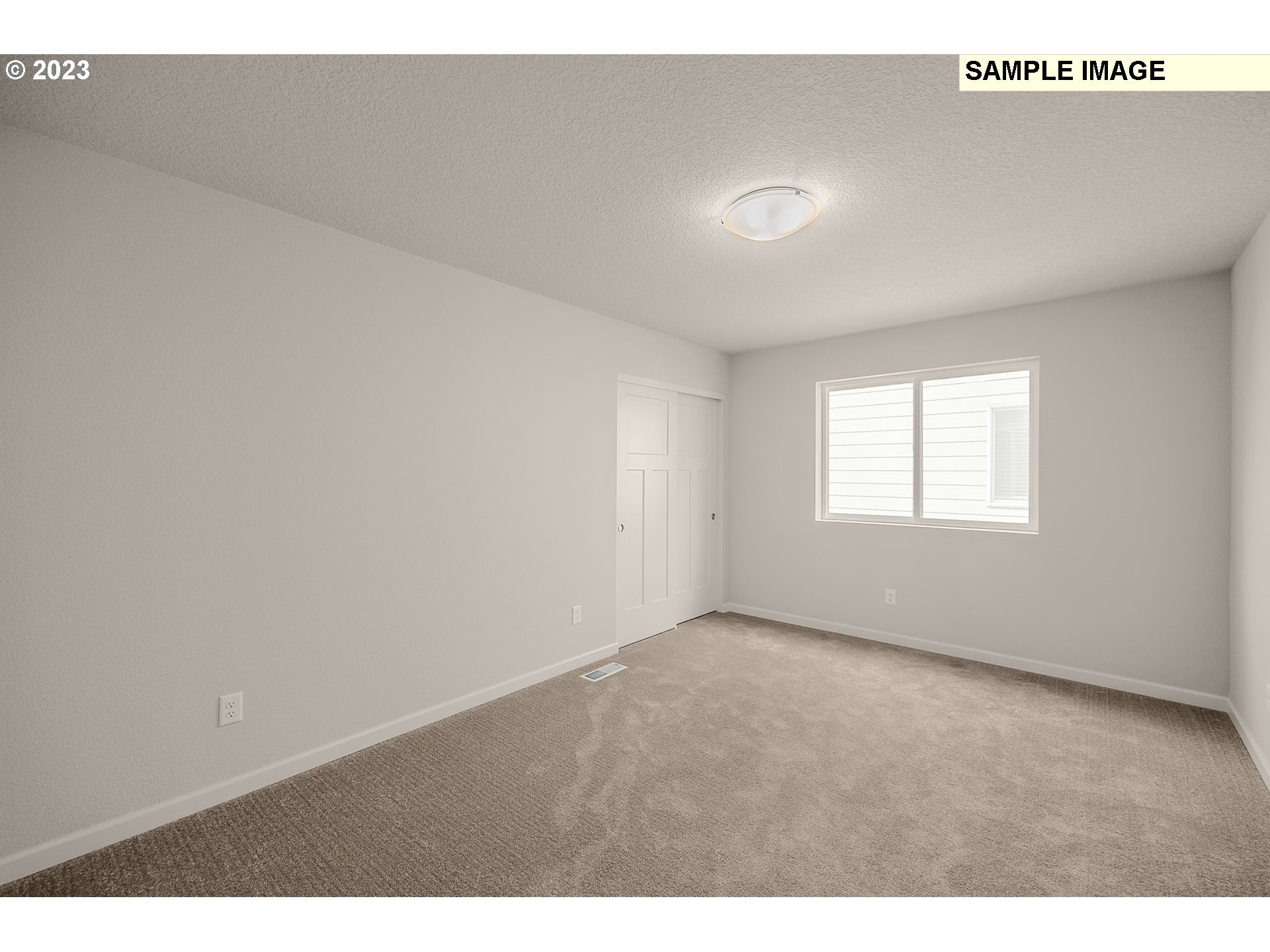 1047 Clemson Street Gervais, OR 97026 - Photo 26 of 38 a view of an empty room with a window