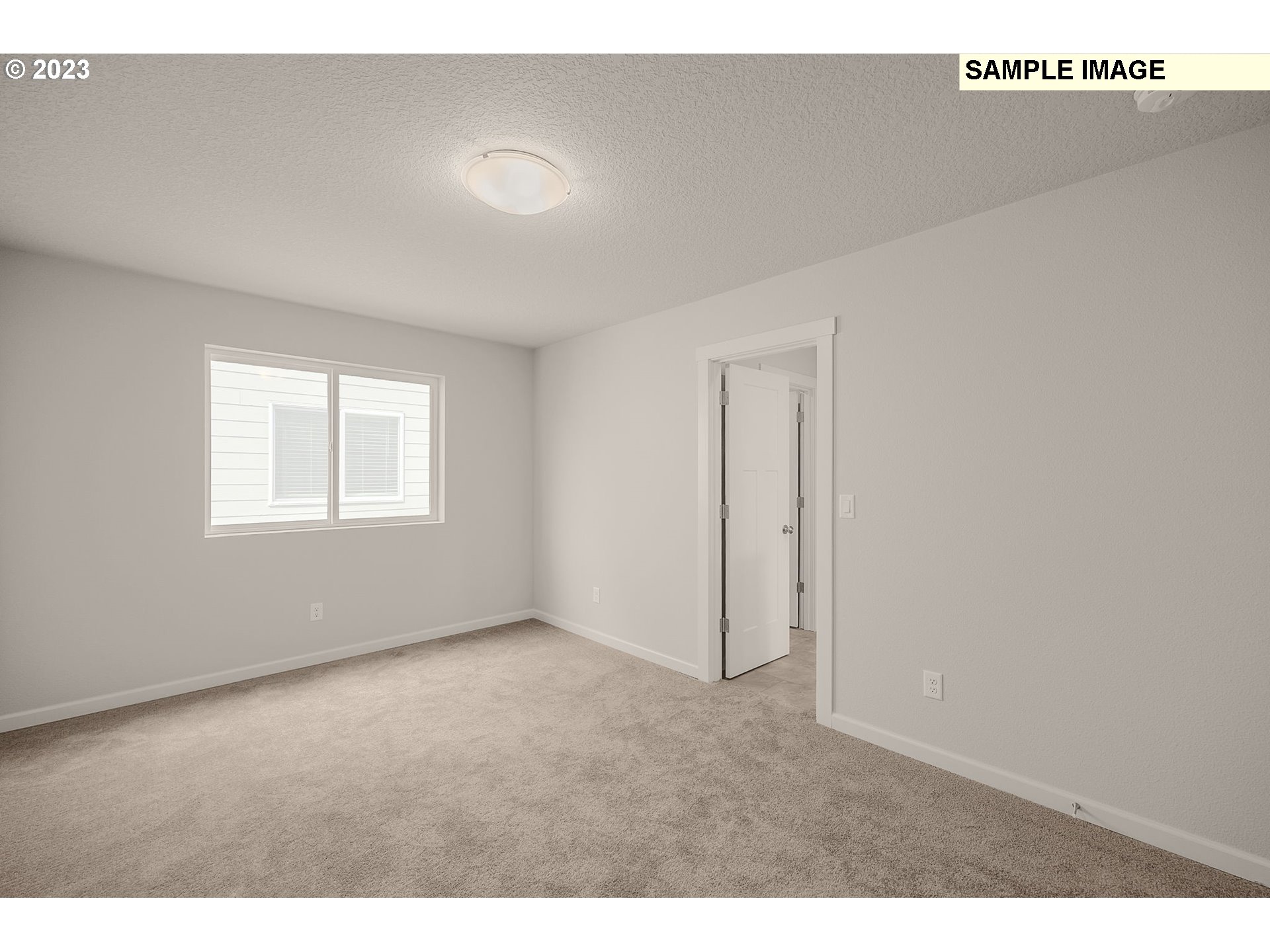 1047 Clemson Street Gervais, OR 97026 - Photo 27 of 38 a view of an empty room with a window