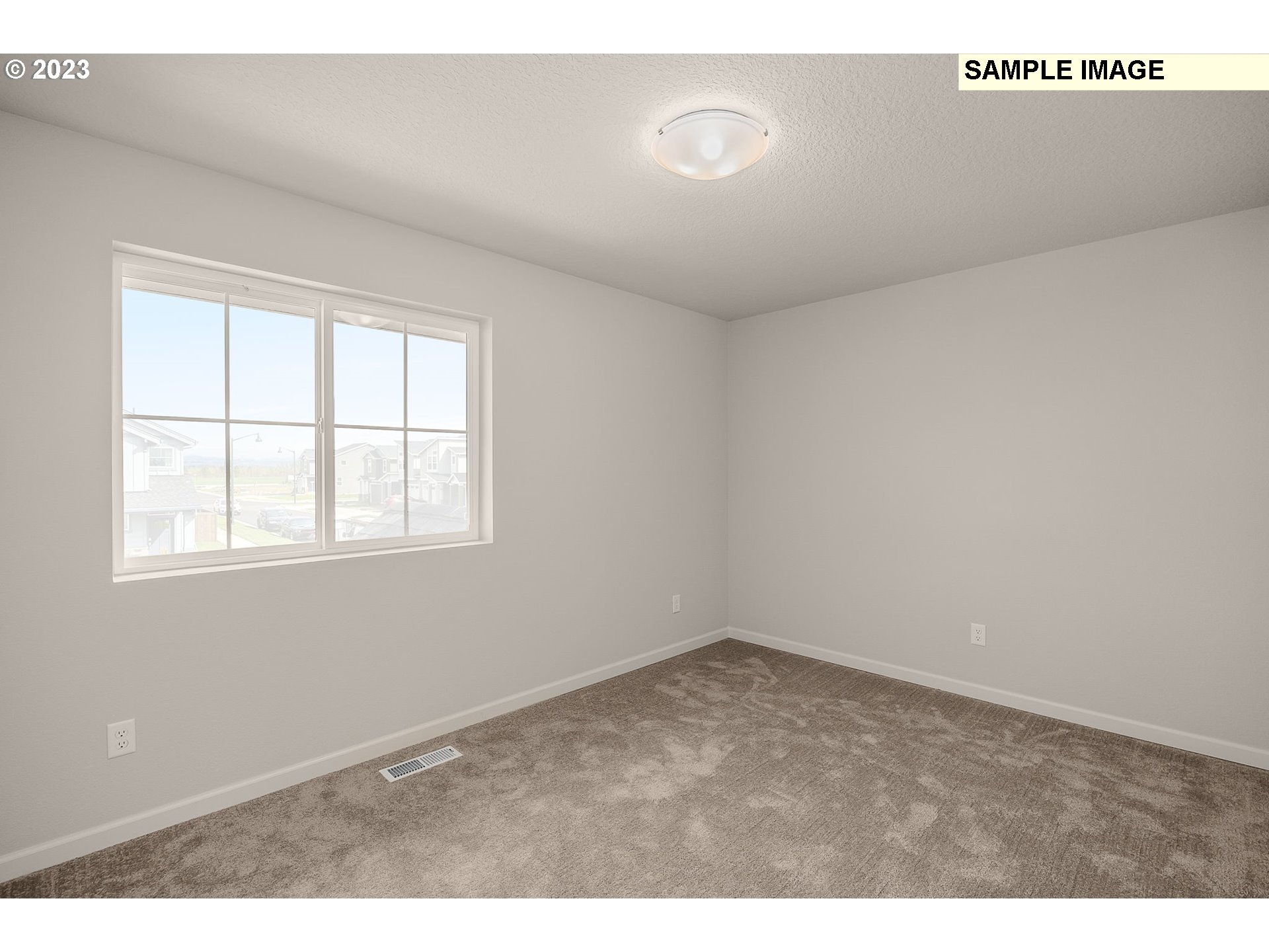 1047 Clemson Street Gervais, OR 97026 - Photo 28 of 38 a view of an empty room with a window