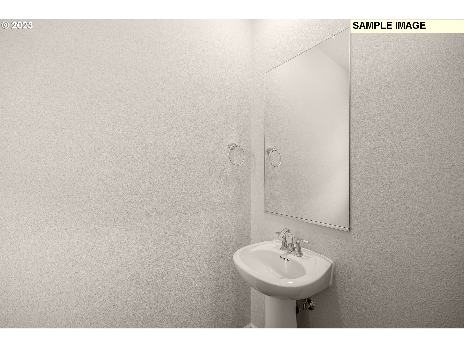 1047 Clemson Street Gervais, OR 97026 - Photo 3 of 38 a bathroom with a sink and a mirror