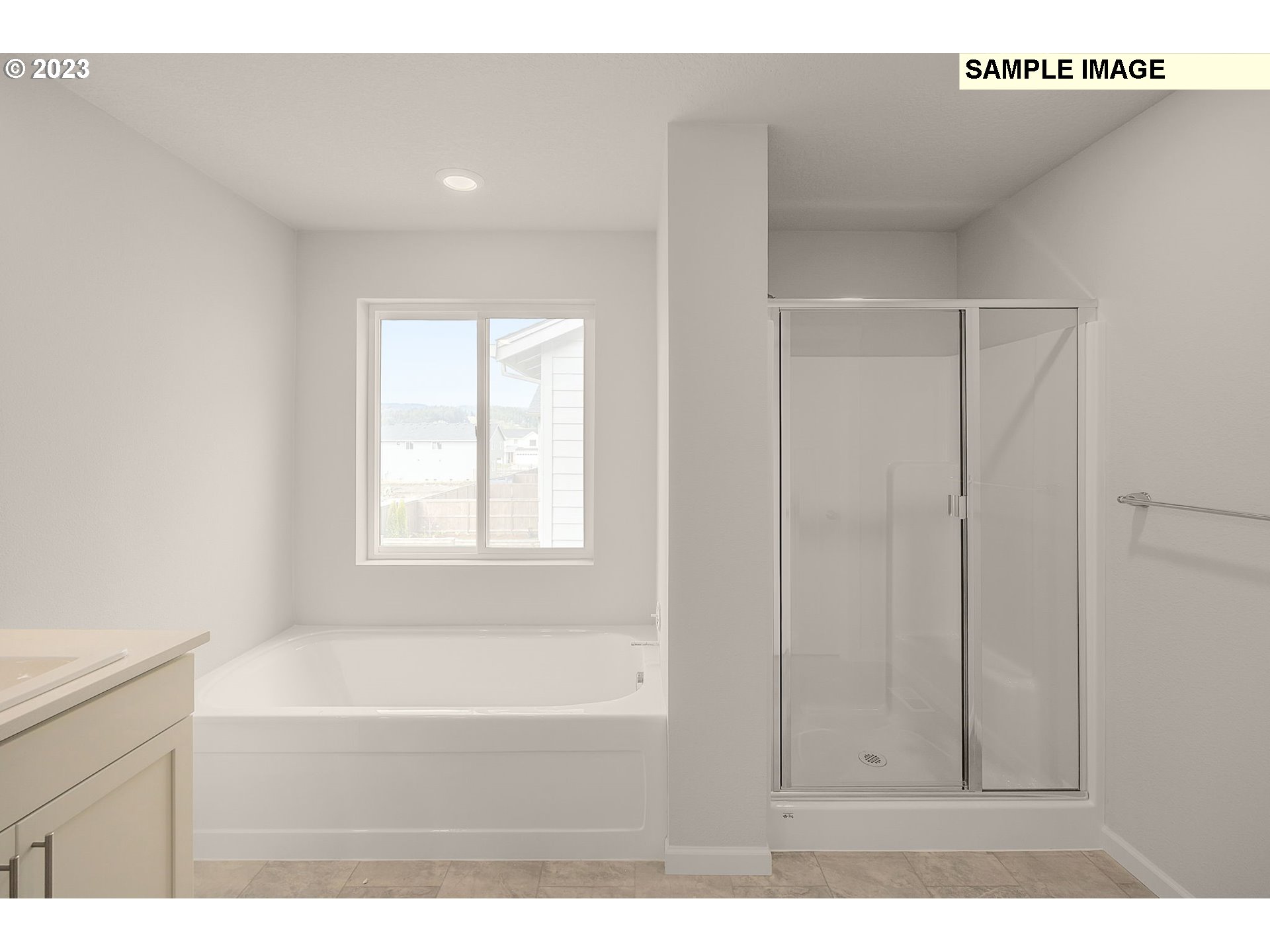 1047 Clemson Street Gervais, OR 97026 - Photo 33 of 38 a bathroom with a bathtub and a shower