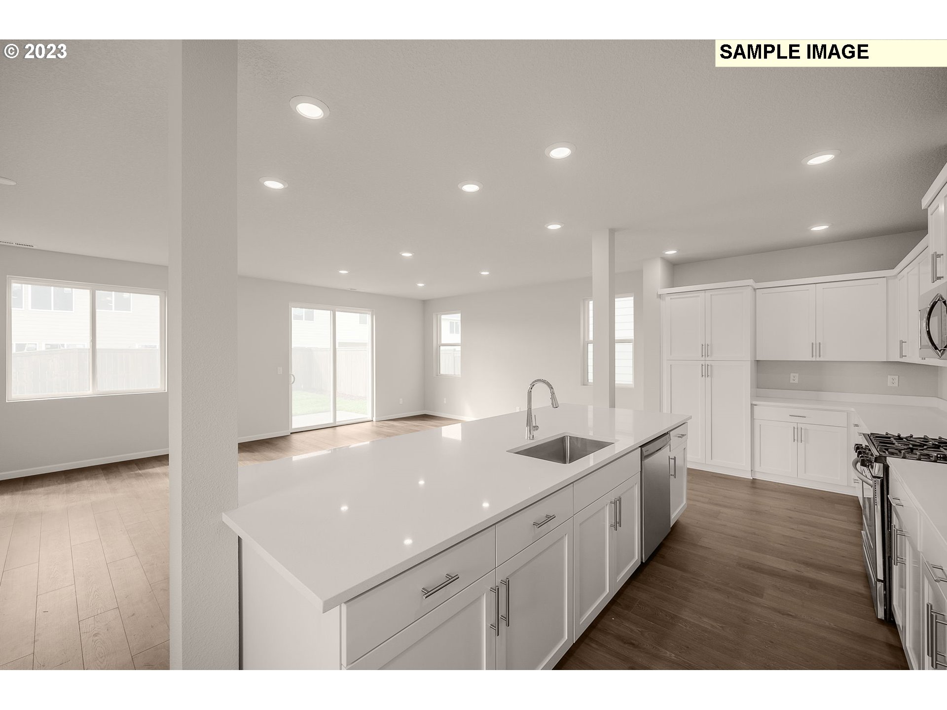 1047 Clemson Street Gervais, OR 97026 - Photo 7 of 38 a kitchen with sink and mirror