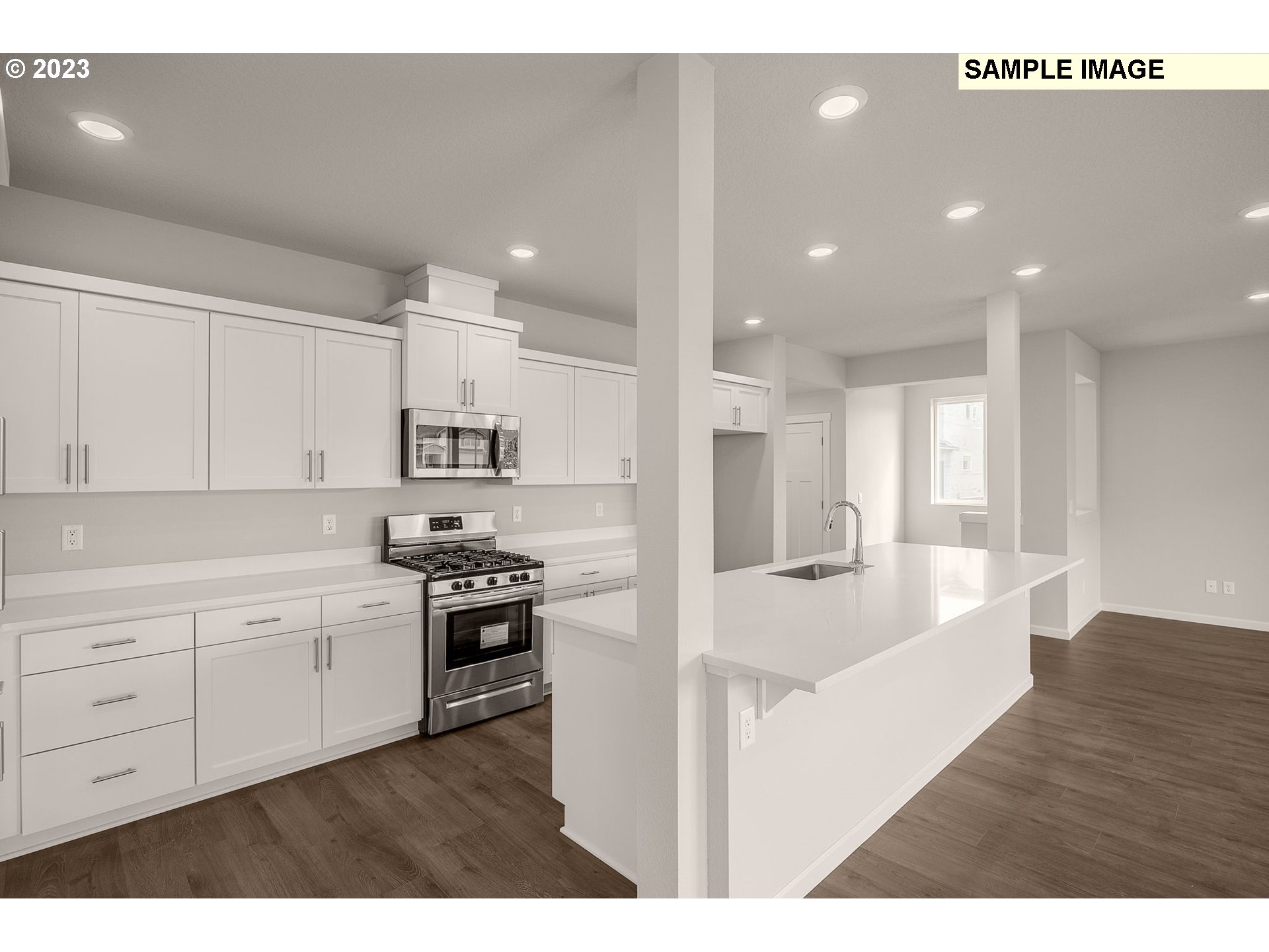 1047 Clemson Street Gervais, OR 97026 - Photo 9 of 38 a kitchen with refrigerator and cabinets