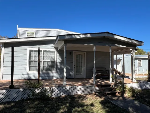 a house view with a outdoor space