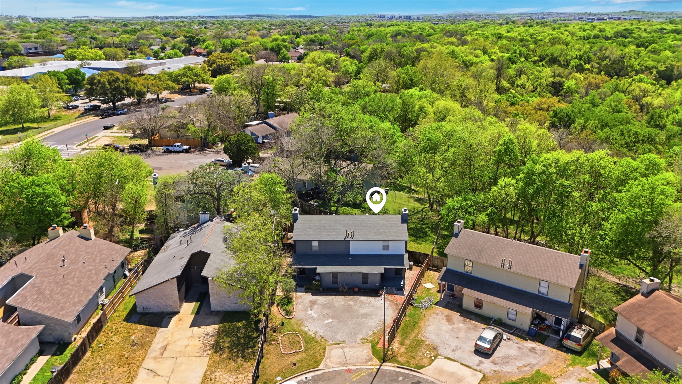 6105 Conti Court, Unit A Austin, TX 78744 - Photo 30 of 36 an aerial view of a house with a garden