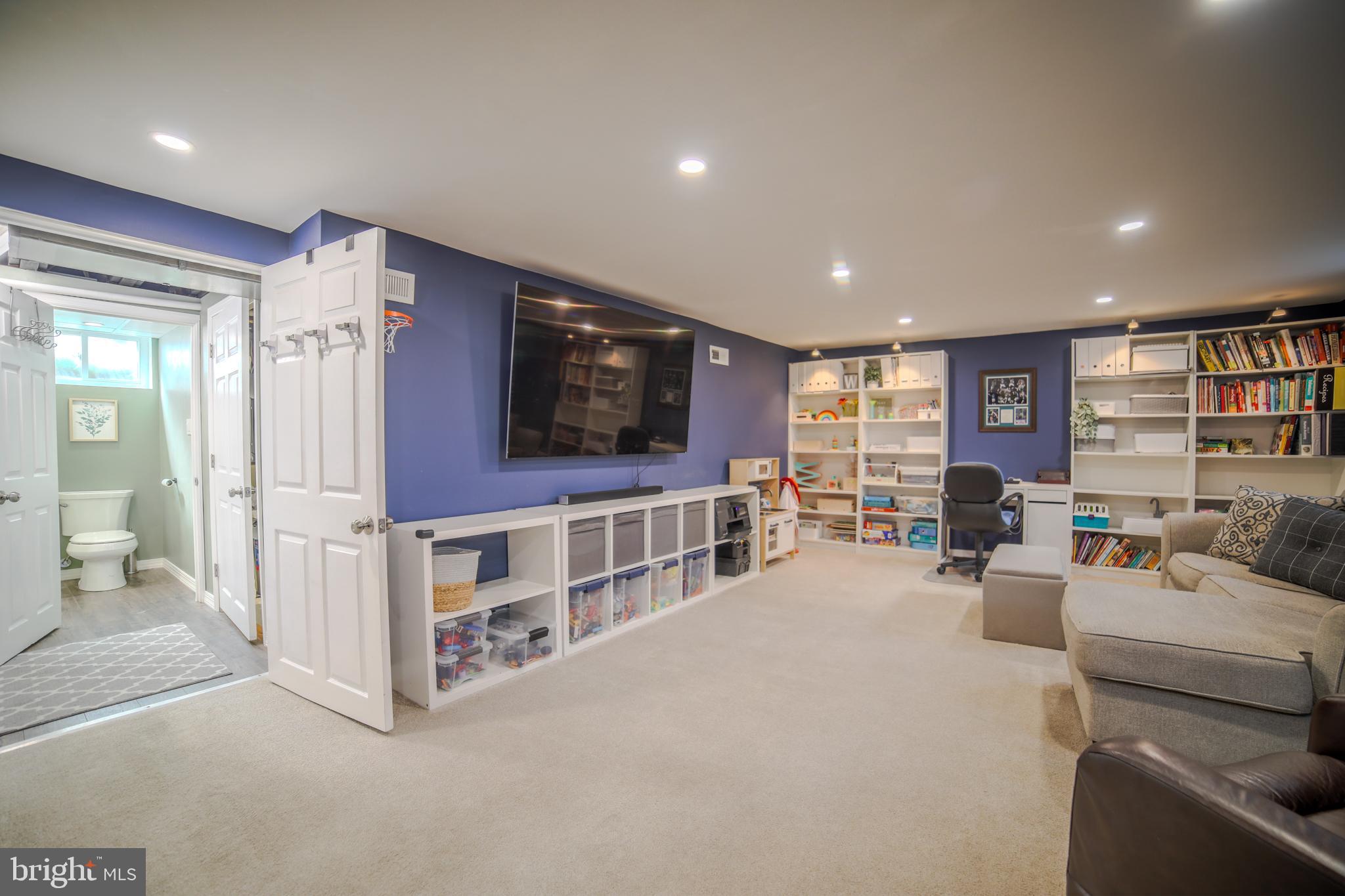 2625 Wendy Road Havertown, PA 19083 - Photo 23 of 39 a living room with furniture and a flat screen tv
