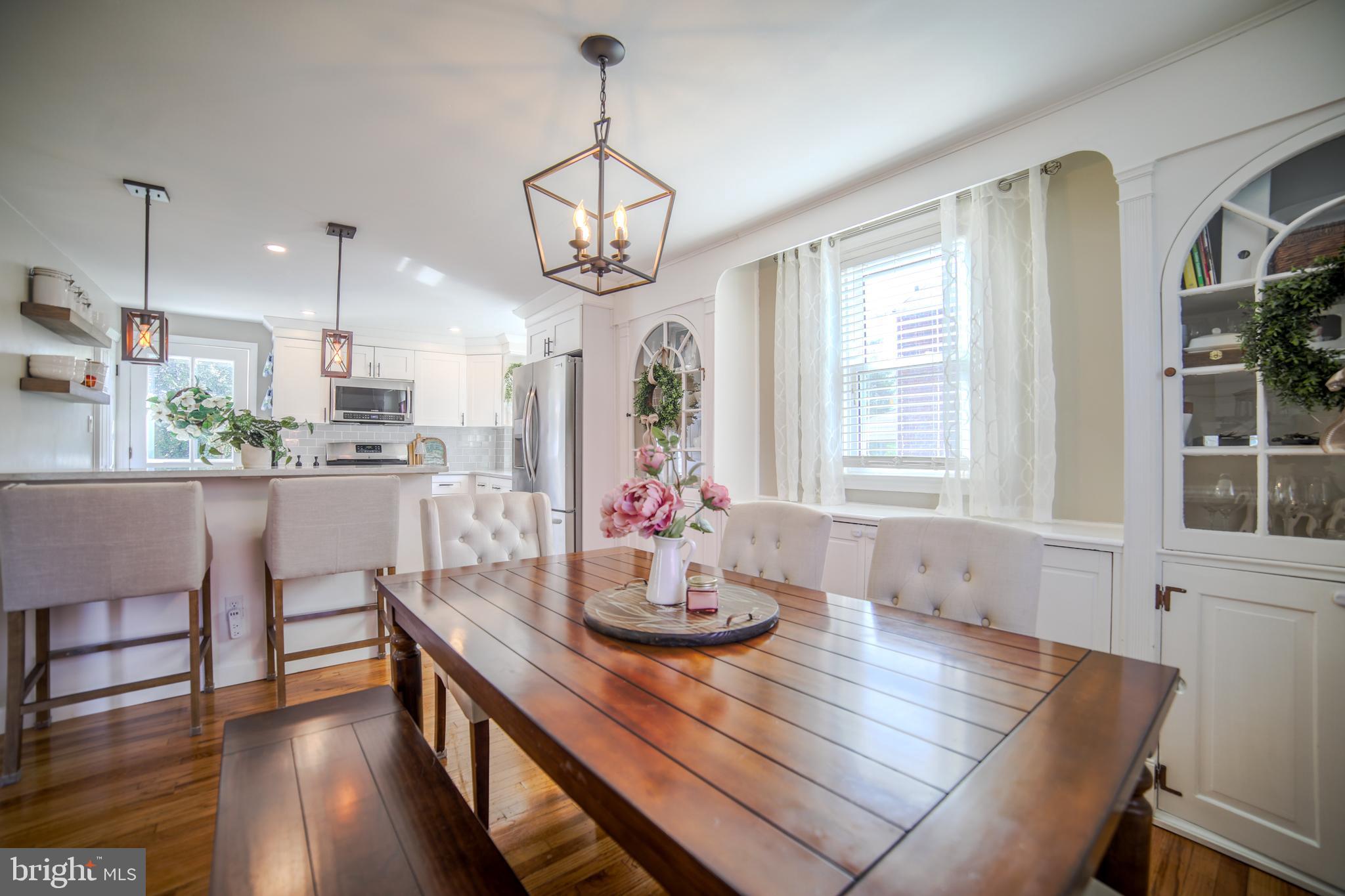2625 Wendy Road Havertown, PA 19083 - Photo 8 of 39 a view of a dining room with furniture window and wooden floor