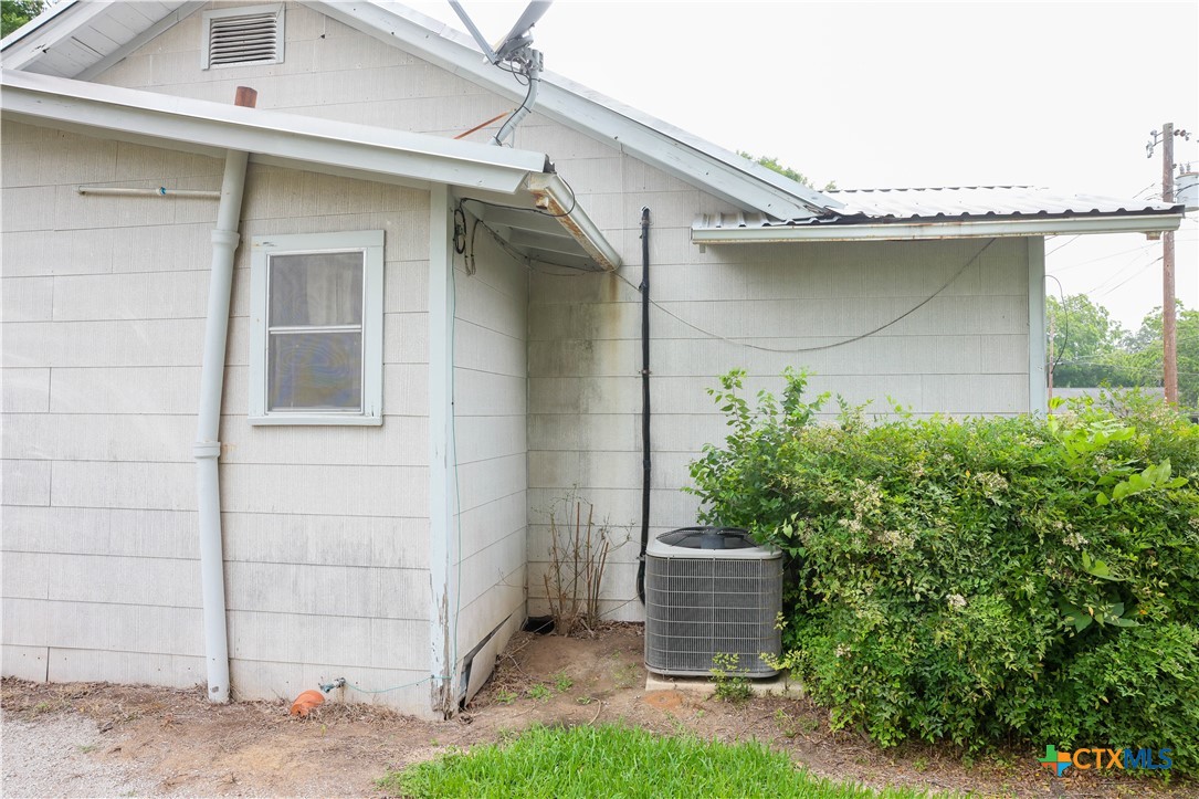 204 Orth Street Yoakum, TX 77995 - Photo 13 of 16 a stone house with a outdoor space