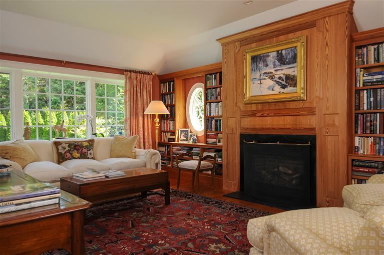 65 Captains Walk North Chatham, MA 02650 - Photo 4 of 13 a living room with furniture a rug and a fireplace