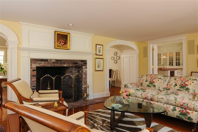 65 Captains Walk North Chatham, MA 02650 - Photo 6 of 13 a living room with furniture and a fireplace