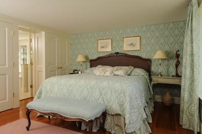 65 Captains Walk North Chatham, MA 02650 - Photo 10 of 13 a bed sitting in a bedroom next to a window