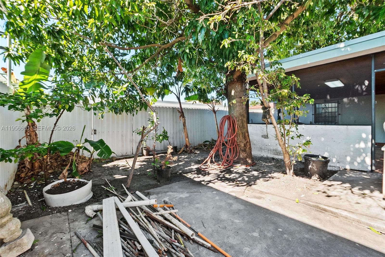 3880 East 8th Lane Hialeah, FL 33013 - Photo 25 of 26 a view of outdoor space yard and patio