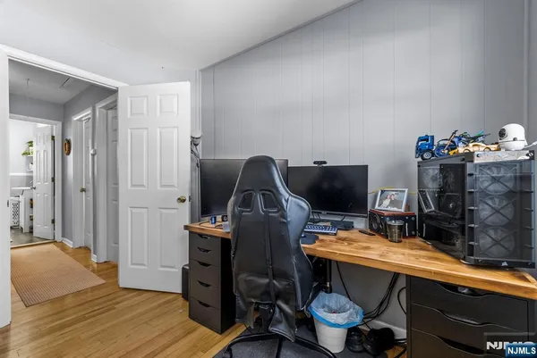a room with furniture and wooden floor