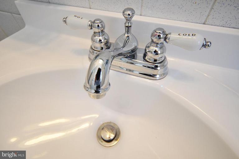 4 Rollwin Road Windsor Mill, MD 21244 - Photo 3 of 24 a view of bathroom with a sink