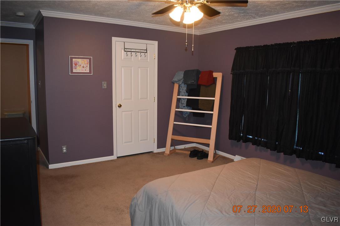 1168 Clearfield Road Nazareth, PA 18064 - Photo 11 of 19 a view of a bedroom with wooden floor and closet