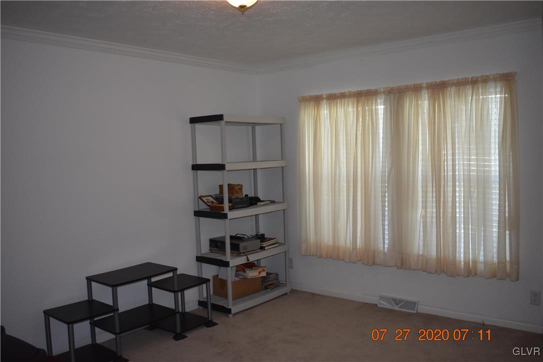 1168 Clearfield Road Nazareth, PA 18064 - Photo 12 of 19 a room with furniture and a window