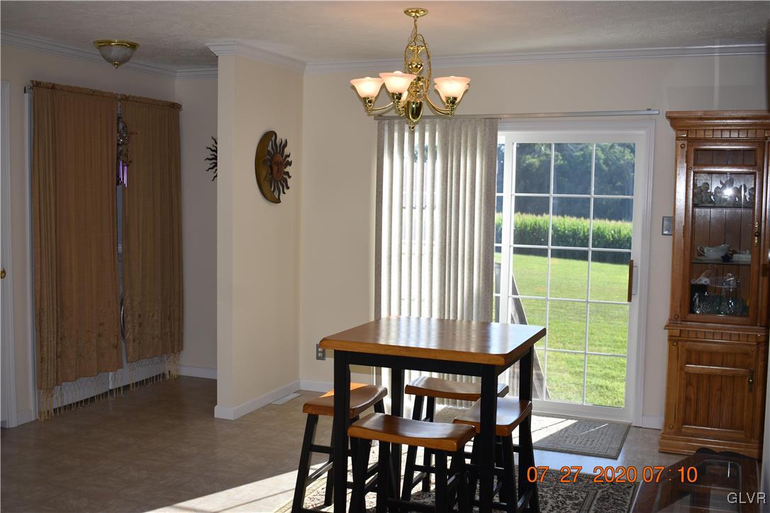 1168 Clearfield Road Nazareth, PA 18064 - Photo 8 of 19 a view of a dining room with furniture window and outside view