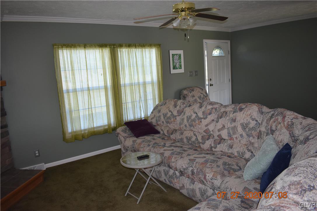 1168 Clearfield Road Nazareth, PA 18064 - Photo 9 of 19 a living room with a bed and a window