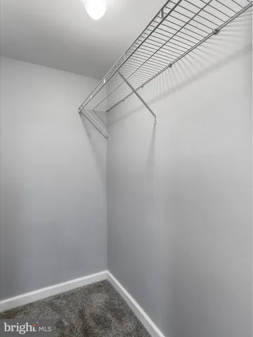 a view of small space with racks on the wall