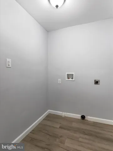 a view of small space with wooden floor