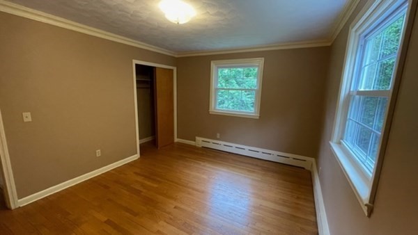 4188 Main Street Palmer, MA 01069 - Photo 12 of 22 an empty room with wooden floor and windows