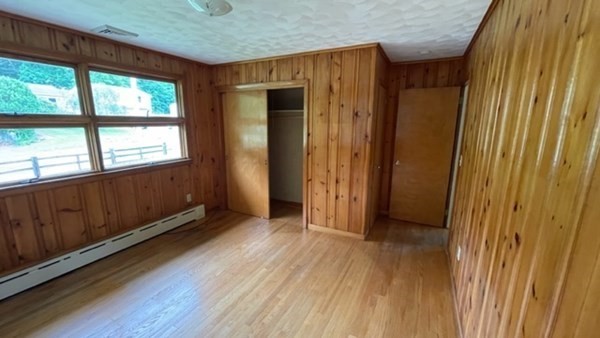 4188 Main Street Palmer, MA 01069 - Photo 13 of 22 an empty room with wooden floor and windows