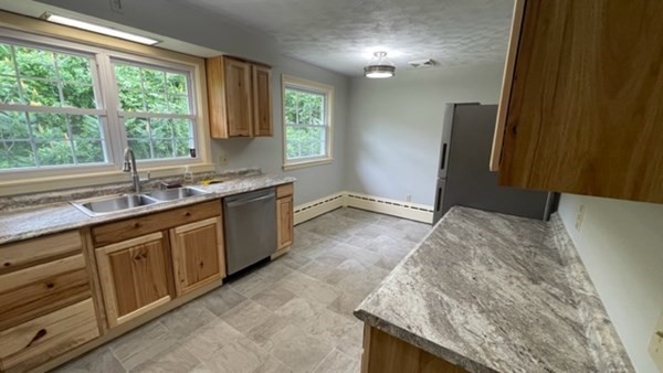 4188 Main Street Palmer, MA 01069 - Photo 10 of 22 a kitchen with a sink and a window