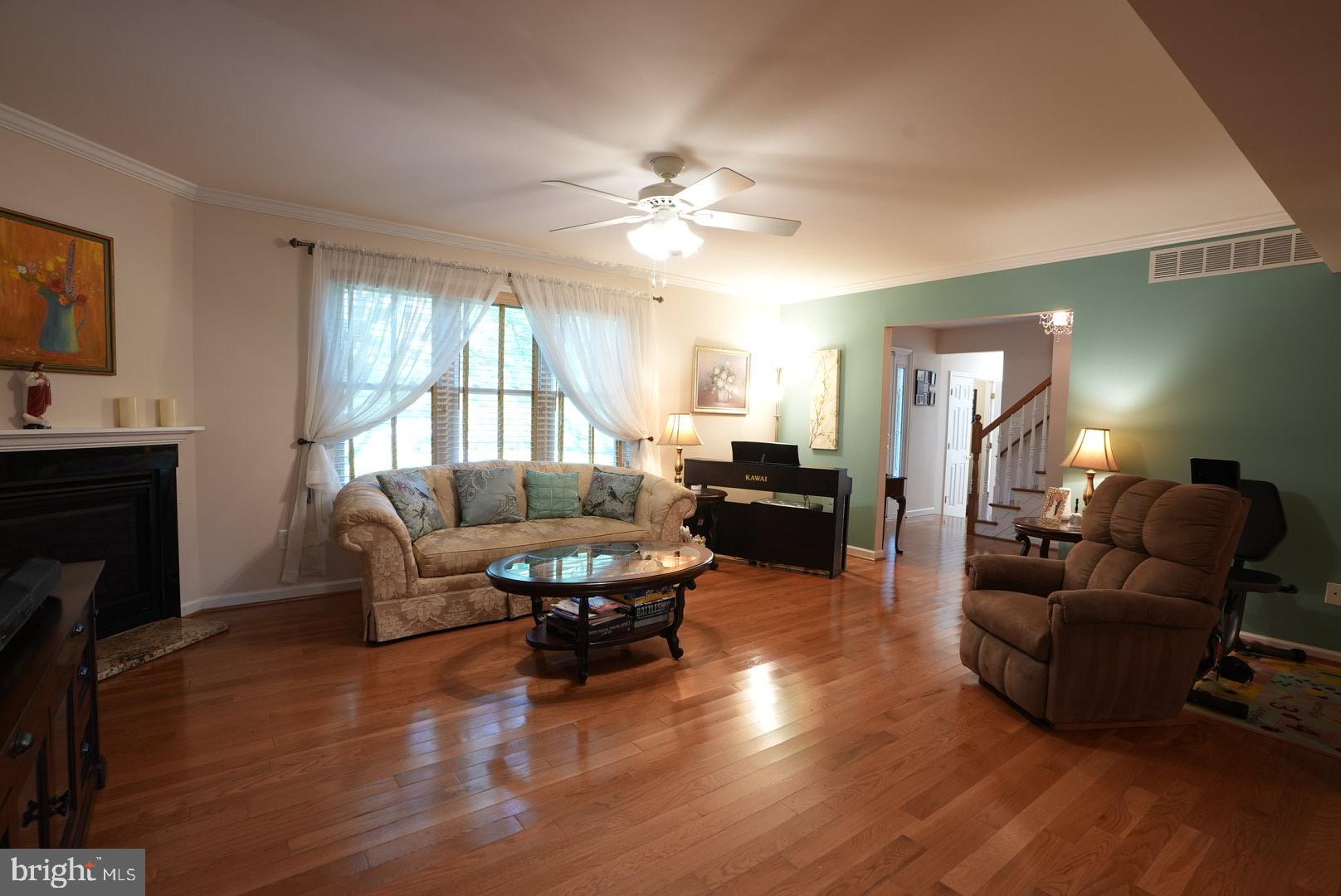 114 Salina Road Sewell, NJ 08080 - Photo 13 of 86 a living room with furniture and a fireplace
